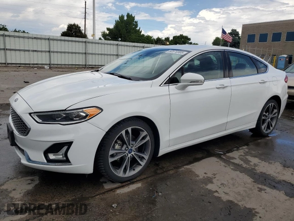 2020 Ford Fusion Titanium with VIN 3FA6P0D96LR175863, listed as a Copart auction lot 60570305 with 76,064 mi miles and Salvage title. Bid and sale history available at DreamBid. Image 1.