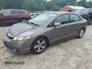 2009 Honda Civic LX-S z VIN 2HGFA16679H511515, wystawiony jako Copart lot #60192285 z przebiegiem 140 918 mil mil oraz Czysty tytuł • Clean title. Historia ofert i sprzedaży dostępna na DreamBid. Obrazek 1.