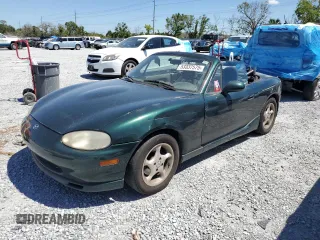 1999 Mazda MX-5 Miata z VIN JM1NB3530X0118452, wystawiony jako Copart lot #53337575 z przebiegiem 150 574 mil mil oraz Czysty tytuł • Clean title. Historia ofert i sprzedaży dostępna na DreamBid. Obrazek 1.