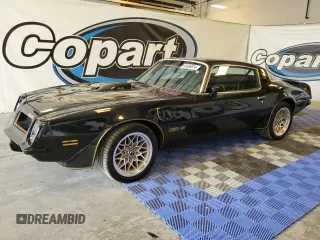 1975 Pontiac Firebird z VIN 2W87S5N561452, wystawiony jako Copart lot #64986614 z przebiegiem 73 434 mil mil oraz Tytuł czysty. Historia ofert i sprzedaży dostępna na DreamBid. Obrazek 1.