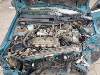 1994 Ford Escort z VIN 1FARP15J1RW125762, wystawiony jako Copart lot #85853184 z przebiegiem 75 229 mil mil oraz Szkoda całkowita • Salvage title. Historia ofert i sprzedaży dostępna na DreamBid. Obrazek 11.