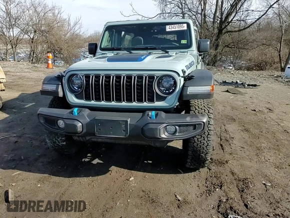 2024 Jeep Wrangler Rubicon with VIN 1C4RJXR61RW255979, listed as a Copart auction lot 43451095 with 7,258 mi miles and Salvage title. Bid and sale history available at DreamBid. Image 12.