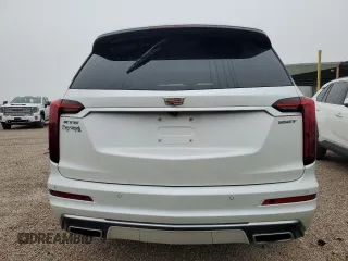 2021 Cadillac XT6 Luxury z VIN 1GYKPAR46MZ132157, wystawiony jako Copart lot #83911054 z przebiegiem 59 473 mil mil oraz Czysty tytuł • Clean title. Historia ofert i sprzedaży dostępna na DreamBid. Obrazek 6.