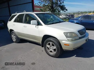 1999 Lexus RX 300 Luxury SUV with VIN JT6GF10U0X0030946, listed as a IAAI auction lot 41755449 with 196,005 mi miles. Bid and sale history available at carsss.com. Image 1.