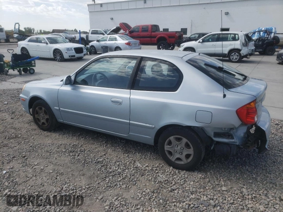2005 Hyundai Accent GLS with VIN KMHCG35C55U341192, listed as a Copart auction lot 70708994 with 174,872 mi miles and Salvage Title. Bid and sale history available at carsss.com. Image 2.