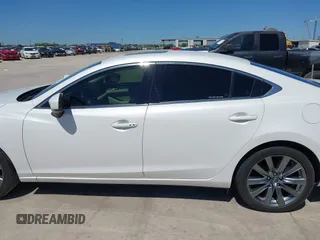 2021 Mazda 6 Touring with VIN JM1GL1VM4M1618686, listed as a IAAI auction lot 42079730 with 55,539 mi miles and . Bid and sale history available at DreamBid. Image 14.