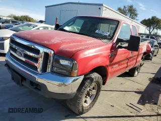 2004 Ford F-250 XL with VIN 1FTNX20P04EB98825, listed as a Copart auction lot 79729074 with 176,099 mi miles and Salvage title. Bid and sale history available at DreamBid. Image 1.