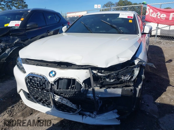 2021 BMW 4 Series 430i with VIN WBA53AP06MCG36919, listed as a IAAI auction lot 41863554 with 33,556 mi miles and . Bid and sale history available at DreamBid. Image 12.
