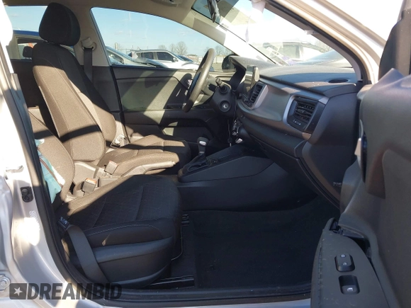 2023 Kia Rio LX with VIN 3KPA24ADXPE606463, listed as a IAAI auction lot 41728523 with 8,909 mi miles and . Bid and sale history available at DreamBid. Image 5.