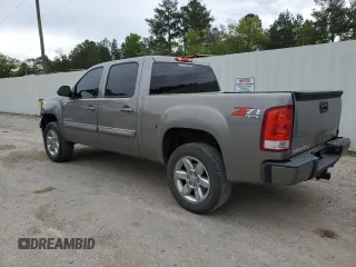 2013 GMC Sierra 1500 SLT with VIN 3GTP2WE25DG159541, listed as a Copart auction lot 50726235 with 46,039 mi miles and Salvage title. Bid and sale history available at DreamBid. Image 2.