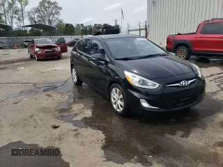 2014 Hyundai Accent SE z VIN KMHCU5AE2EU164130, wystawiony jako Copart lot #50972055 z przebiegiem 113 834 mil mil oraz Szkoda całkowita • Salvage title. Historia ofert i sprzedaży dostępna na DreamBid. Obrazek 14.