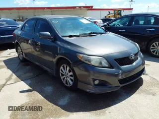 2010 Toyota Corolla with VIN 2T1BU4EEXAC463697, listed as a IAAI auction lot 42099807 with 206,160 mi miles. Bid and sale history available at carsss.com. Image 1.
