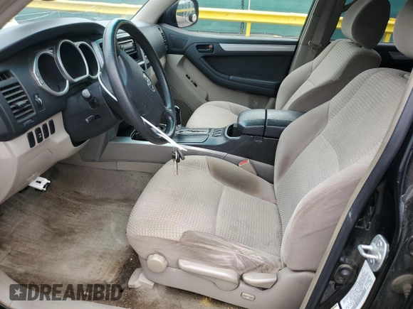 2004 Toyota 4Runner SR5 with VIN JTEBU14R648020185, listed as a Copart auction lot 58983875 with 242,594 mi miles and Clean title. Bid and sale history available at DreamBid. Image 7.