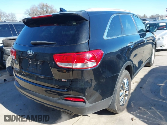 2018 Kia Sorento LX with VIN 5XYPG4A39JG342455, listed as a IAAI auction lot 41366386 with 131,033 mi miles. Bid and sale history available at carsss.com. Image 4.