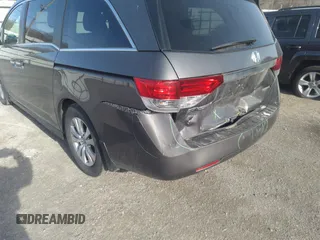 2014 Honda Odyssey EX-L with VIN 5FNRL5H64EB037646, listed as a IAAI auction lot 41786768 with 116,491 mi miles and . Bid and sale history available at carsss.com. Image 6.