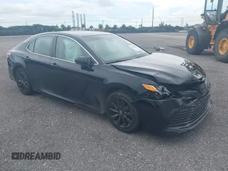 2019 Toyota Camry LE z VIN 4T1B11HKXKU737845, wystawiony jako IAAI lot #41553682 z przebiegiem 70 074 mil mil oraz . Historia ofert i sprzedaży dostępna na DreamBid. Obrazek 1.