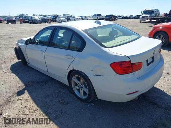 2014 BMW 3 Series 320i with VIN WBA3B1C59EP678908, listed as a IAAI auction lot 41774738 with 143,975 mi miles. Bid and sale history available at carsss.com. Image 3.