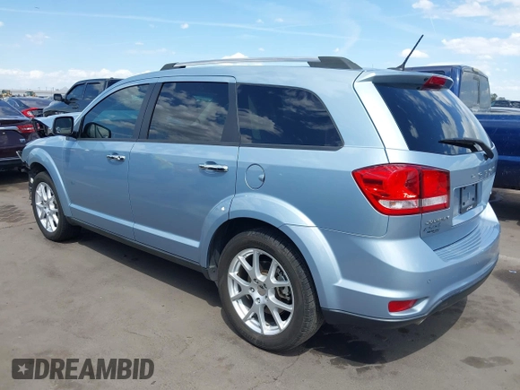 2013 Dodge Journey Crew with VIN 3C4PDCDG4DT680215, listed as a IAAI auction lot 42041962 with 82,705 mi miles and . Bid and sale history available at DreamBid. Image 3.
