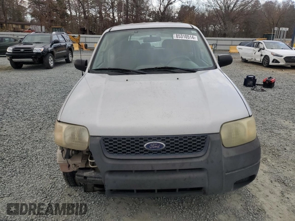 2004 Ford Escape with VIN 1FMCU02144KB63439, listed as a Copart auction lot 85310514 with 275,625 mi miles and Salvage title. Bid and sale history available at DreamBid. Image 5.