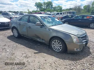 2011 Cadillac CTS Premium with VIN 1G6DS5EDXB0147694, listed as a IAAI auction lot 42753378 with 202,591 mi miles and . Bid and sale history available at DreamBid. Image 1.