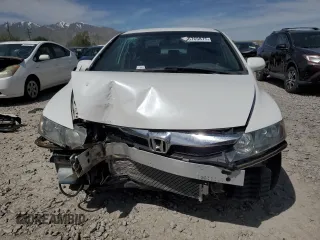 2006 Honda Civic LX z VIN 1HGFA16566L003977, wystawiony jako Copart lot #56765875 z przebiegiem 220 705 mil mil oraz Szkoda całkowita • Salvage title. Historia ofert i sprzedaży dostępna na DreamBid. Obrazek 5.