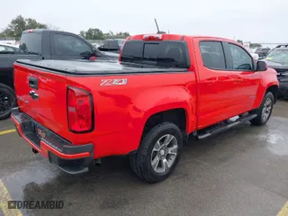 2019 Chevrolet Colorado 4WD Z71 with VIN 1GCGTDEN0K1359685, listed as a IAAI auction lot 41644666 with 64,029 mi miles. Bid and sale history available at carsss.com. Image 4.