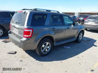 2011 Ford Escape Limited with VIN 1FMCU0EG2BKA67855, listed as a IAAI auction lot 41808002 with 183,476 mi miles. Bid and sale history available at carsss.com. Image 4.