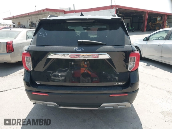 2023 Ford Explorer XLT with VIN 1FMSK7DH5PGB18456, listed as a IAAI auction lot 42067888 with 20,856 mi miles. Bid and sale history available at carsss.com. Image 16.