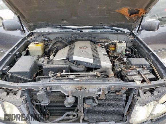 2003 Lexus LX 470 z VIN JTJHT00W033530306, wystawiony jako Copart lot #57162675 z przebiegiem 185 458 mil mil oraz Szkoda całkowita • Salvage title. Historia ofert i sprzedaży dostępna na DreamBid. Obrazek 12.