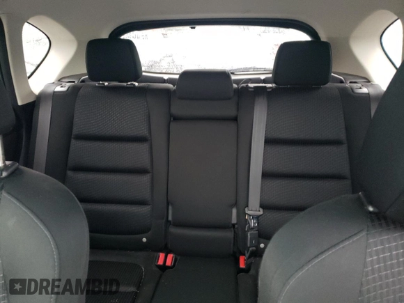 2014 Mazda CX-5 Touring z VIN JM3KE4CY1E0406726, wystawiony jako Copart lot #54652065 z przebiegiem 245 491 mil mil oraz Szkoda całkowita • Salvage title. Historia ofert i sprzedaży dostępna na DreamBid. Obrazek 10.