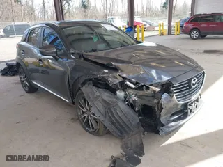 2017 Mazda CX-3 Grand Touring with VIN JM1DKFD70H0150496, listed as a IAAI auction lot 41746038 with 108,091 mi miles. Bid and sale history available at carsss.com. Image 1.