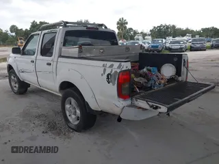 2001 Nissan Frontier SE z VIN 1N6ED27T61C324671, wystawiony jako IAAI lot #42403537 z przebiegiem 190 638 mil mil oraz . Historia ofert i sprzedaży dostępna na DreamBid. Obrazek 3.