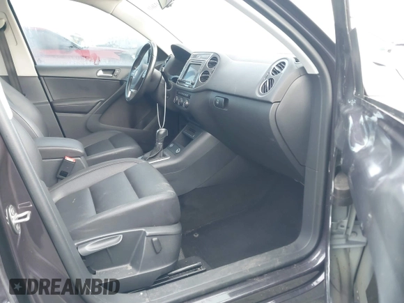 2016 Volkswagen Tiguan S with VIN WVGBV7AX5GW568438, listed as a IAAI auction lot 41434616 with 91,341 mi miles and . Bid and sale history available at DreamBid. Image 5.
