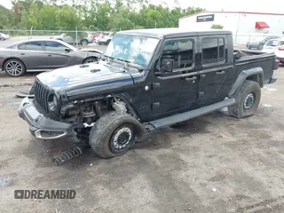 2021 Jeep Gladiator Sport S with VIN 1C6JJTAM3ML546307, listed as a IAAI auction lot 42635138 with Not provided miles and . Bid and sale history available at DreamBid. Image 18.