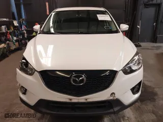 2015 Mazda CX-5 Touring with VIN JM3KE4CY4F0509530, listed as a IAAI auction lot 41858134 with 102,360 mi miles. Bid and sale history available at carsss.com. Image 12.