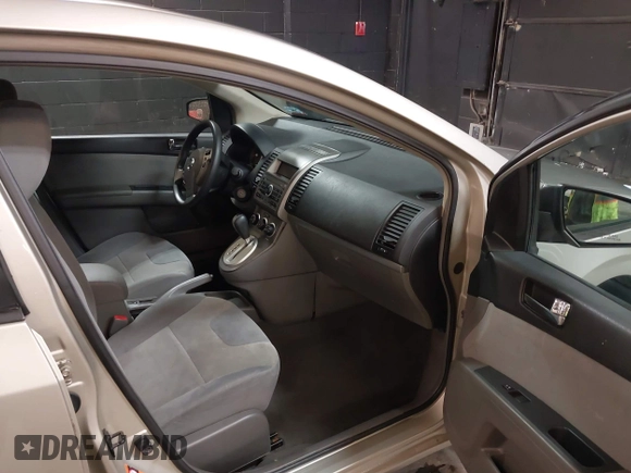 2009 Nissan Sentra S FE+ z VIN 3N1AB61E19L655492, wystawiony jako IAAI lot #42169403 z przebiegiem 131 164 mil mil oraz . Historia ofert i sprzedaży dostępna na DreamBid. Obrazek 5.