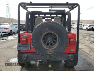 2003 Jeep Wrangler Rubicon z VIN 1J4FA69S43P321494, wystawiony jako Copart lot #43614905 z przebiegiem 99 001 mil mil oraz Czysty tytuł • Clean title. Historia ofert i sprzedaży dostępna na DreamBid. Obrazek 6.