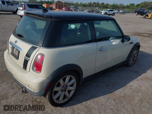 2006 MINI Hardtop with VIN WMWRC33596TK73174, listed as a IAAI auction lot 41848500 with 182,704 mi miles and . Bid and sale history available at DreamBid. Image 4.