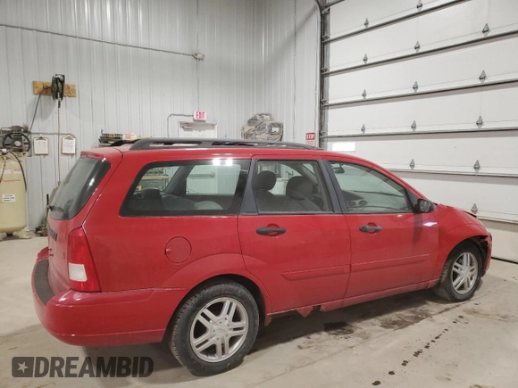 2001 Ford Focus SE with VIN 1FAFP36321W214680, listed as a Copart auction lot 43692915 with 157,811 mi miles and Salvage Title. Bid and sale history available at carsss.com. Image 3.