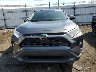 2021 Toyota RAV4 XLE with VIN 2T3W1RFV8MC098471, listed as a Copart auction lot 50675815 with 56,949 mi miles and Salvage Title. Bid and sale history available at carsss.com. Image 5.
