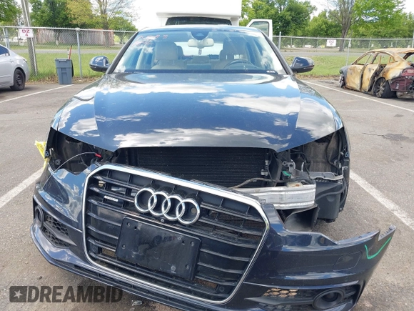 2013 Audi A6 Prestige z VIN WAUJGAFC6DN005023, wystawiony jako IAAI lot #42201985 z przebiegiem 80 337 mil mil oraz . Historia ofert i sprzedaży dostępna na DreamBid. Obrazek 6.