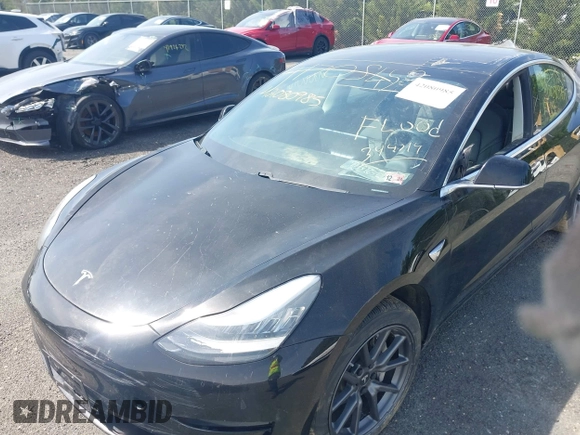 2019 Tesla Model 3 Mid Range with VIN 5YJ3E1EA0KF394514, listed as a IAAI auction lot 42080985 with Not Provided miles and . Bid and sale history available at DreamBid. Image 6.