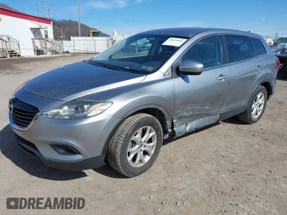 2015 Mazda CX-9 Sport with VIN JM3TB2BA6F0455539, listed as a IAAI auction lot 41839466 with 143,667 mi miles and . Bid and sale history available at carsss.com. Image 2.