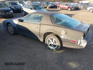 1988 Pontiac Firebird with VIN 1G2FW21F2JL251274, listed as a IAAI auction lot 41766168 with 999,999 mi miles. Bid and sale history available at carsss.com. Image 3.