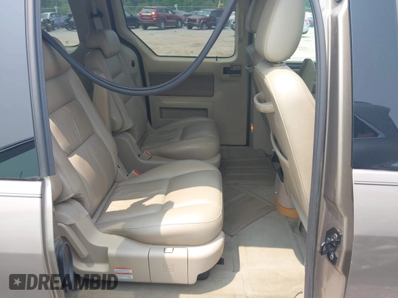 2006 Ford Freestar SEL z VIN 2FMZA52246BA45154, wystawiony jako IAAI lot #42393983 z przebiegiem 100 447 mil mil oraz . Historia ofert i sprzedaży dostępna na DreamBid. Obrazek 8.