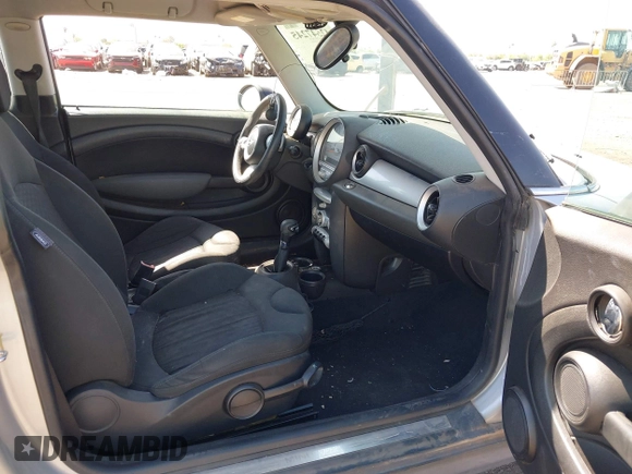 2007 MINI Hardtop with VIN WMWMF33547TL77235, listed as a IAAI auction lot 42547245 with 144,179 mi miles and . Bid and sale history available at DreamBid. Image 5.