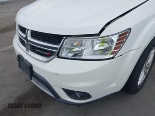 2015 Dodge Journey SXT with VIN 3C4PDDBG9FT606686, listed as a IAAI auction lot 42048201 with 107,593 mi miles and . Bid and sale history available at DreamBid. Image 6.
