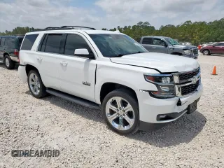 2019 Chevrolet Tahoe LT with VIN 1GNSCBKC1KR226315, listed as a Copart auction lot 57215915 with 153,170 mi miles and Salvage title. Bid and sale history available at DreamBid. Image 4.