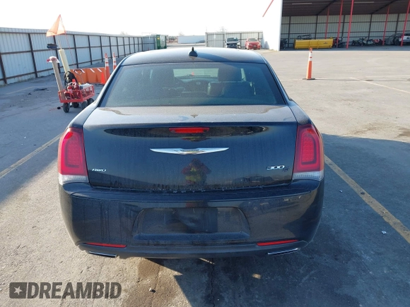 2015 Chrysler 300 with VIN 2C3CCAGG8FH808618, listed as a IAAI auction lot 41695711 with 137,050 mi miles. Bid and sale history available at carsss.com. Image 17.