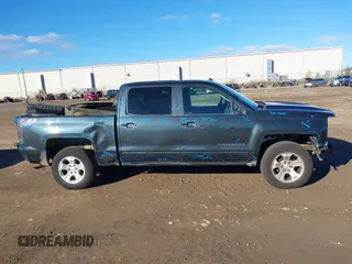 2018 Chevrolet Silverado 1500 LT with VIN 3GCUKRECXJG321396, listed as a IAAI auction lot 40851181 with 137,348 mi miles. Bid and sale history available at carsss.com. Image 13.